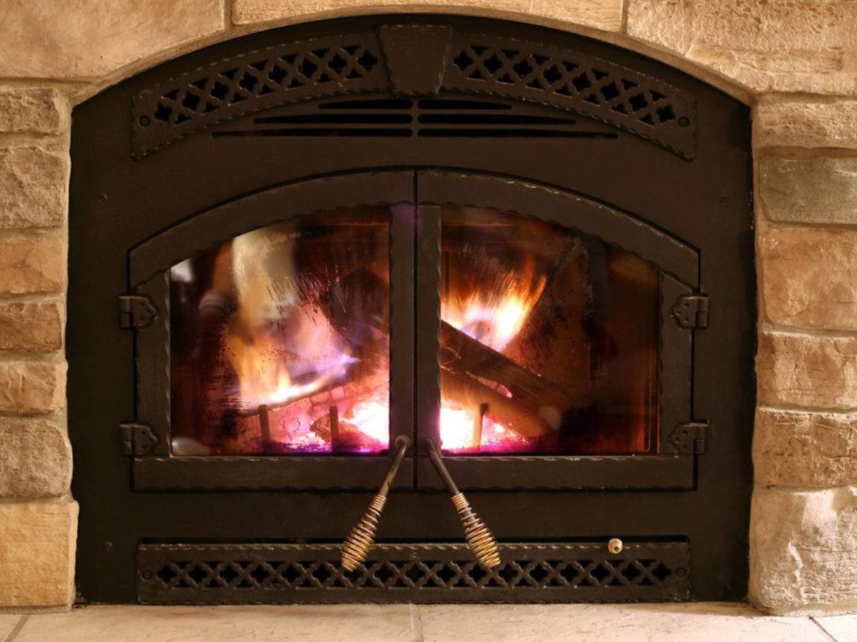 Insulation around old brick fireplace